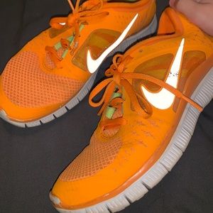 Orange Nike Free Runs